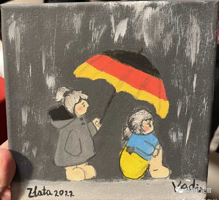 一名烏克蘭兒童畫畫感謝收留他們的德國家庭